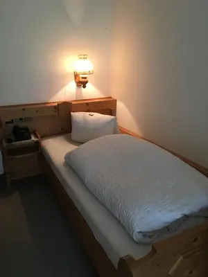 Ein Bett oder Betten in einem Zimmer der Unterkunft Hubergut Appartements