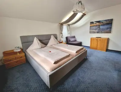 Ein Bett oder Betten in einem Zimmer der Unterkunft Aberseehaus Nussbaumer