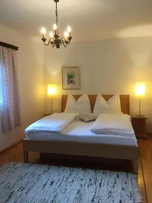 Ein Bett oder Betten in einem Zimmer der Unterkunft Bergarbeiterhäuser