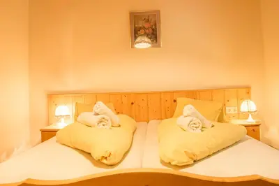 Ein Bett oder Betten in einem Zimmer der Unterkunft Hotel Gell