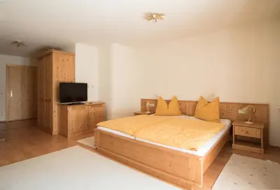 Ein Bett oder Betten in einem Zimmer der Unterkunft Fürbaß Haus