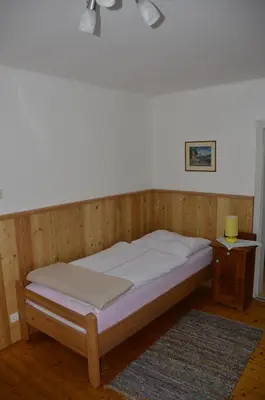 Ein Bett oder Betten in einem Zimmer der Unterkunft Haus Rosina