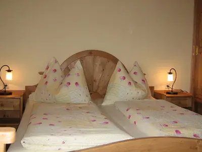 Ein Bett oder Betten in einem Zimmer der Unterkunft Ringlerhof
