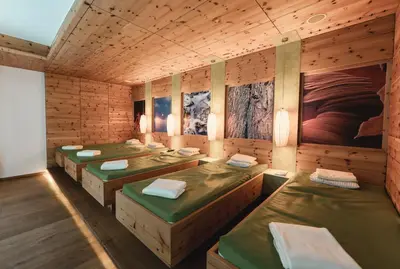 Ein Bett oder Betten in einem Zimmer der Unterkunft Genusshotel Fichtenhof