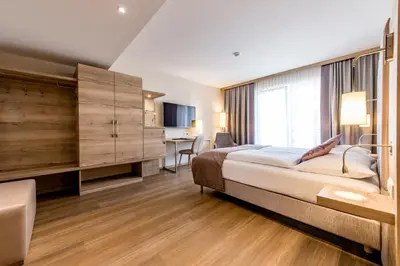 Ein Bett oder Betten in einem Zimmer der Unterkunft Hotel Krone
