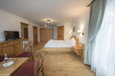 Ein Bett oder Betten in einem Zimmer der Unterkunft Hotel Schartner