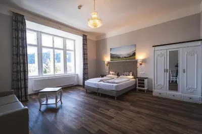 Ein Bett oder Betten in einem Zimmer der Unterkunft Villa Bergzauber