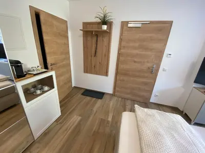Ein Bett oder Betten in einem Zimmer der Unterkunft Im Kurpark