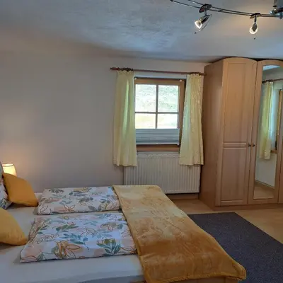 Ein Bett oder Betten in einem Zimmer der Unterkunft Reiters-Ferienhaus