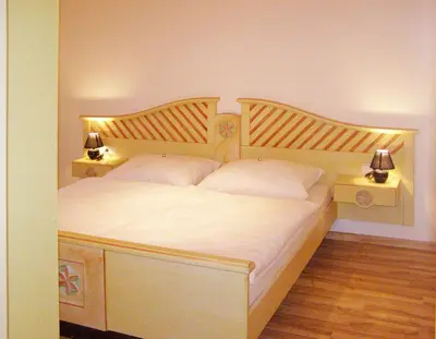 Ein Bett oder Betten in einem Zimmer der Unterkunft Haus Santorum