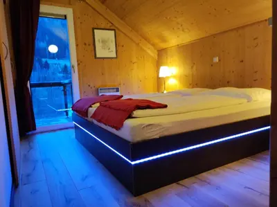 Ein Bett oder Betten in einem Zimmer der Unterkunft Panorama-Chalet Alpenglöckchen