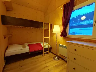 Ein Bett oder Betten in einem Zimmer der Unterkunft Panorama-Chalet Alpenglöckchen