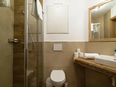 Ein Badezimmer in der Unterkunft Apartment Alpendorf near Ski Slopes