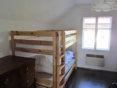 Ein Bett oder Betten in einem Zimmer der Unterkunft Chalet 