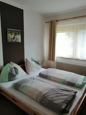 Ein Bett oder Betten in einem Zimmer der Unterkunft Large cozy apartment Grubweg 130 qm
