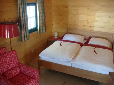 Ein Bett oder Betten in einem Zimmer der Unterkunft Postalm Lodge