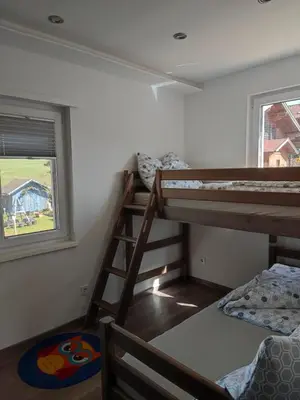 Ein Bett oder Betten in einem Zimmer der Unterkunft Ferienwohnungen Sammer