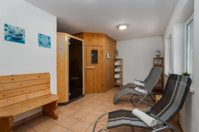 Ein Sitzbereich in der Unterkunft Hotel Laaxerhof