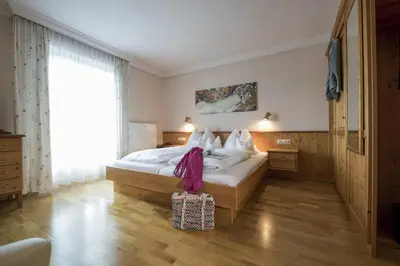 Ein Bett oder Betten in einem Zimmer der Unterkunft Hotel & Restaurant Ragginger Attersee