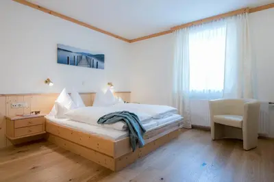 Ein Bett oder Betten in einem Zimmer der Unterkunft Hotel & Restaurant Ragginger Attersee