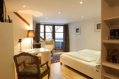 Ein Bett oder Betten in einem Zimmer der Unterkunft Litzlberger Keller am Attersee