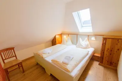 Ein Bett oder Betten in einem Zimmer der Unterkunft JUFA Hotel Murau