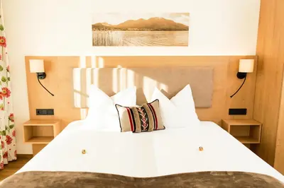 Ein Bett oder Betten in einem Zimmer der Unterkunft Frühstückspension Huber