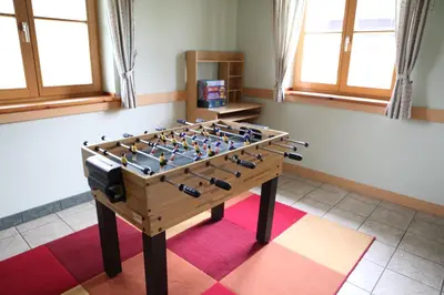Eine Spielezimmer in der Unterkunft Rosenhof