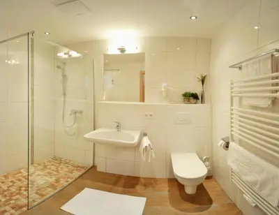 Ein Badezimmer in der Unterkunft Hotel Sonnschupfer