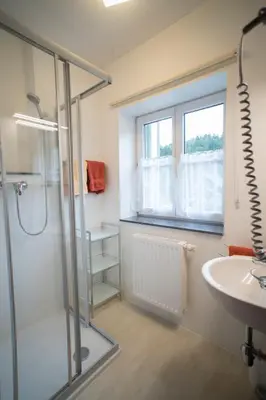 Ein Badezimmer in der Unterkunft Gasthof Staud'nwirt