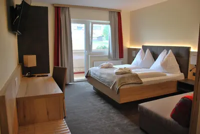 Ein Bett oder Betten in einem Zimmer der Unterkunft Hotel Pariente