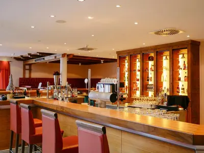 Ein Restaurant oder anderes Speiselokal in der Unterkunft ROBINSON AMADÉ