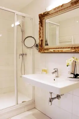 Ein Badezimmer in der Unterkunft Stadthotel Restaurant Auerhahn
