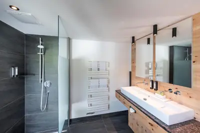 Ein Badezimmer in der Unterkunft ALMGUT - Mountain Wellness Hotel