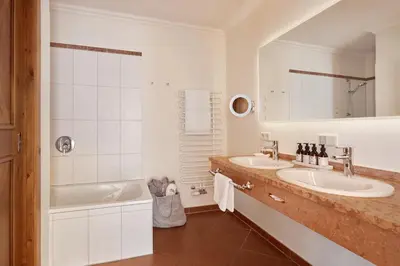 Ein Badezimmer in der Unterkunft Hotel Oberforsthof