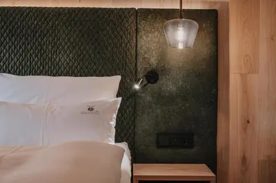 Ein Bett oder Betten in einem Zimmer der Unterkunft Hotel Oberforsthof