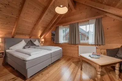 Ein Bett oder Betten in einem Zimmer der Unterkunft AlpenParks Hagan Lodge Altaussee
