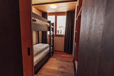 Ein Bett oder Betten in einem Zimmer der Unterkunft Dilly - Das Nationalpark Resort