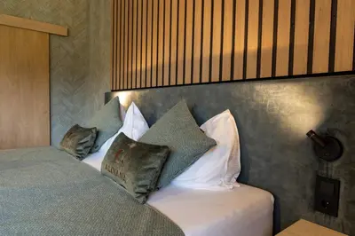 Ein Bett oder Betten in einem Zimmer der Unterkunft Aldiana Club Salzkammergut und GrimmingTherme