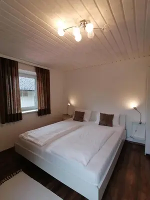 Ein Bett oder Betten in einem Zimmer der Unterkunft Steakhouse Fieg