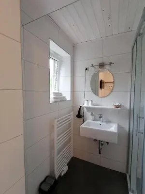 Ein Badezimmer in der Unterkunft Steakhouse Fieg