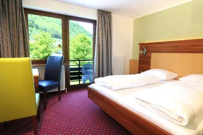 Ein Bett oder Betten in einem Zimmer der Unterkunft Hocheck