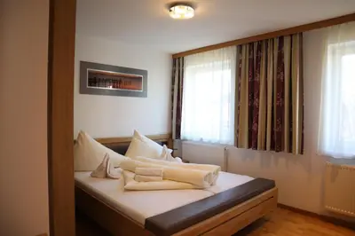Ein Bett oder Betten in einem Zimmer der Unterkunft Jasmin