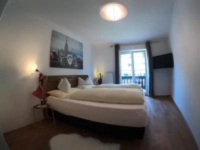 Ein Bett oder Betten in einem Zimmer der Unterkunft Ferienwohnung Kaffeewerkstatt