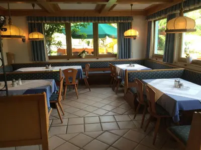 Ein Restaurant oder anderes Speiselokal in der Unterkunft Gasthof Tennenblick