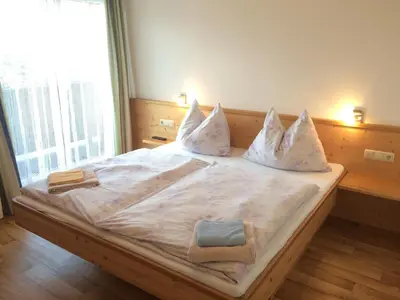 Ein Bett oder Betten in einem Zimmer der Unterkunft Gasthof Tennenblick