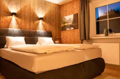 Ein Bett oder Betten in einem Zimmer der Unterkunft Landhaus Thurner