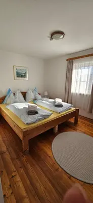 Ein Bett oder Betten in einem Zimmer der Unterkunft Landhaus Tippl