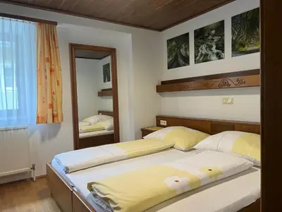 Ein Bett oder Betten in einem Zimmer der Unterkunft Leitner