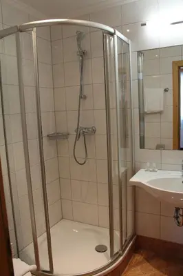 Ein Badezimmer in der Unterkunft Hotel Grafenwirt